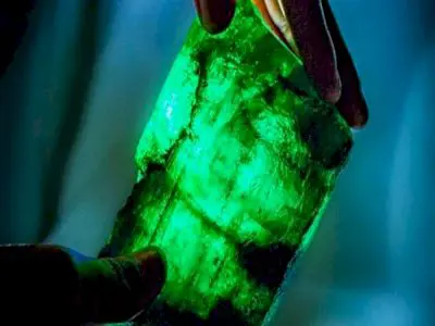When rough emerald is extracted from the mine, it is thrown into barrels of oil, and this oil facilitates the cutting process