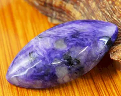 Charoite stone energy helps you to easily overcome the most difficult job